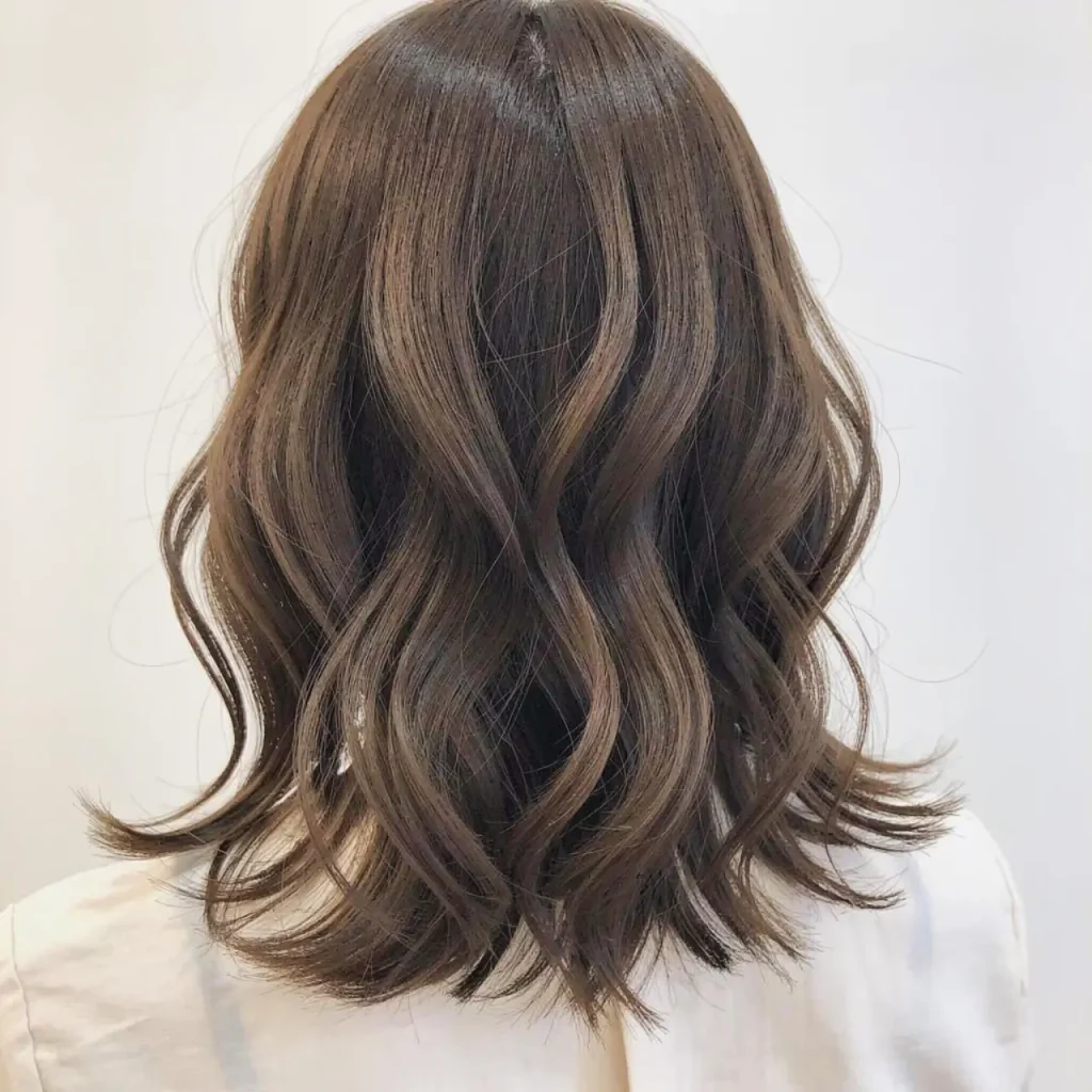 7. Wavy Shoulder Length Cut